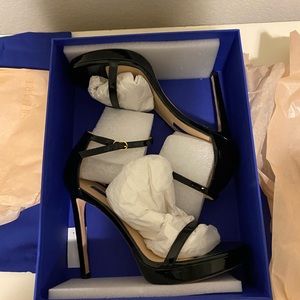 Stuart Weitzman Nudist Disco in black.